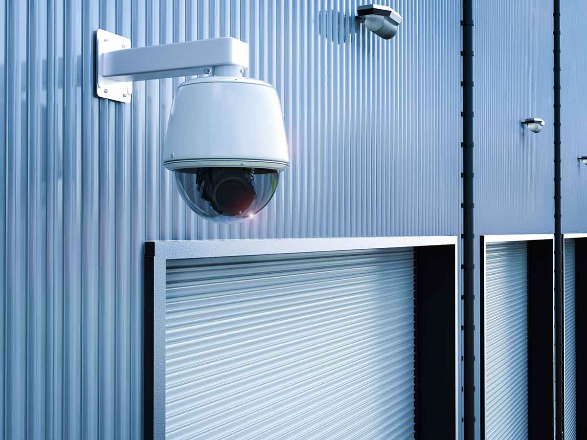 Dome security camera on the outside of the warehouse